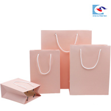 recycled pink color Kraft paper packaging hand bags with paper twisted handles